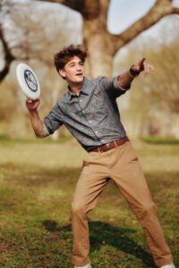 a man gets ready to throw a frisbee