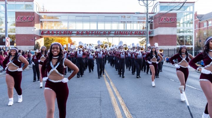 the Maroonettes lead the Marching Colonels during a parade