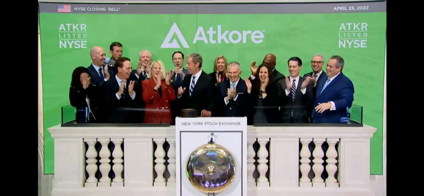 Jeri Isbell on the New York Stock Exchange floor to ring the closing bell with the Atkore board.