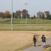 Photo of people walking track next to Intramural Field