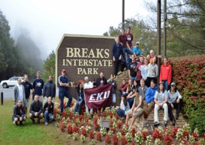 sociology students pose at Breaks Interstate Park sign