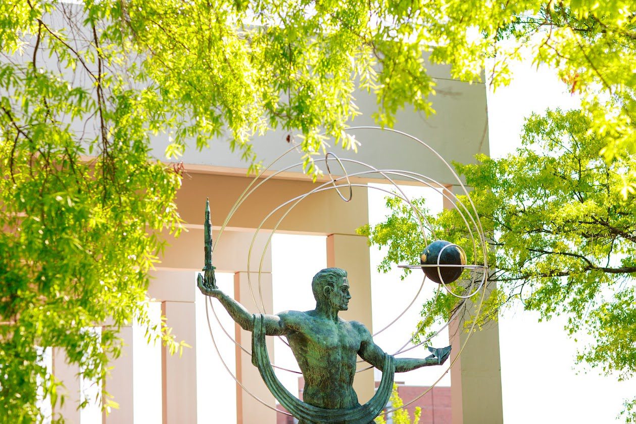 Apollo statue on campus outside of the Powell building