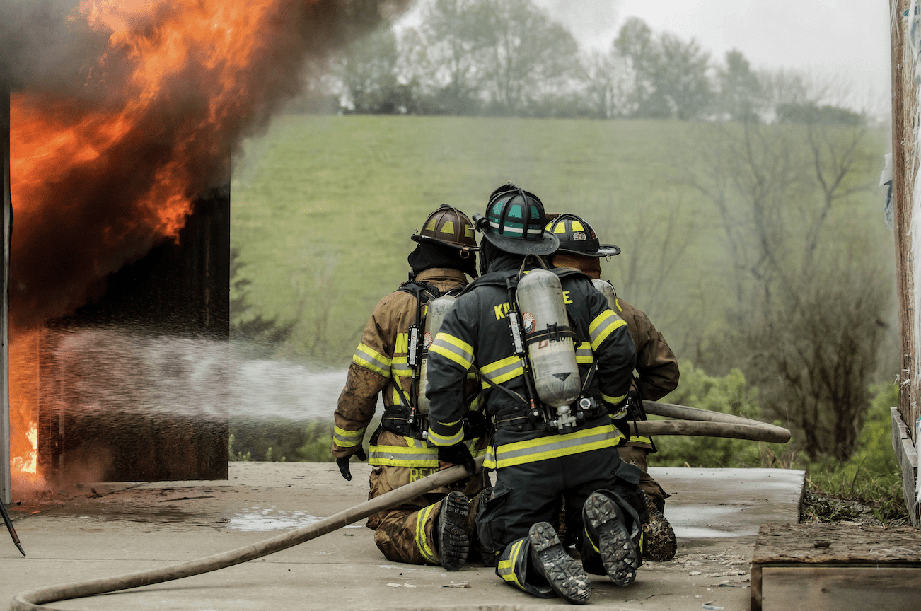 Firefighters putting out a fire.