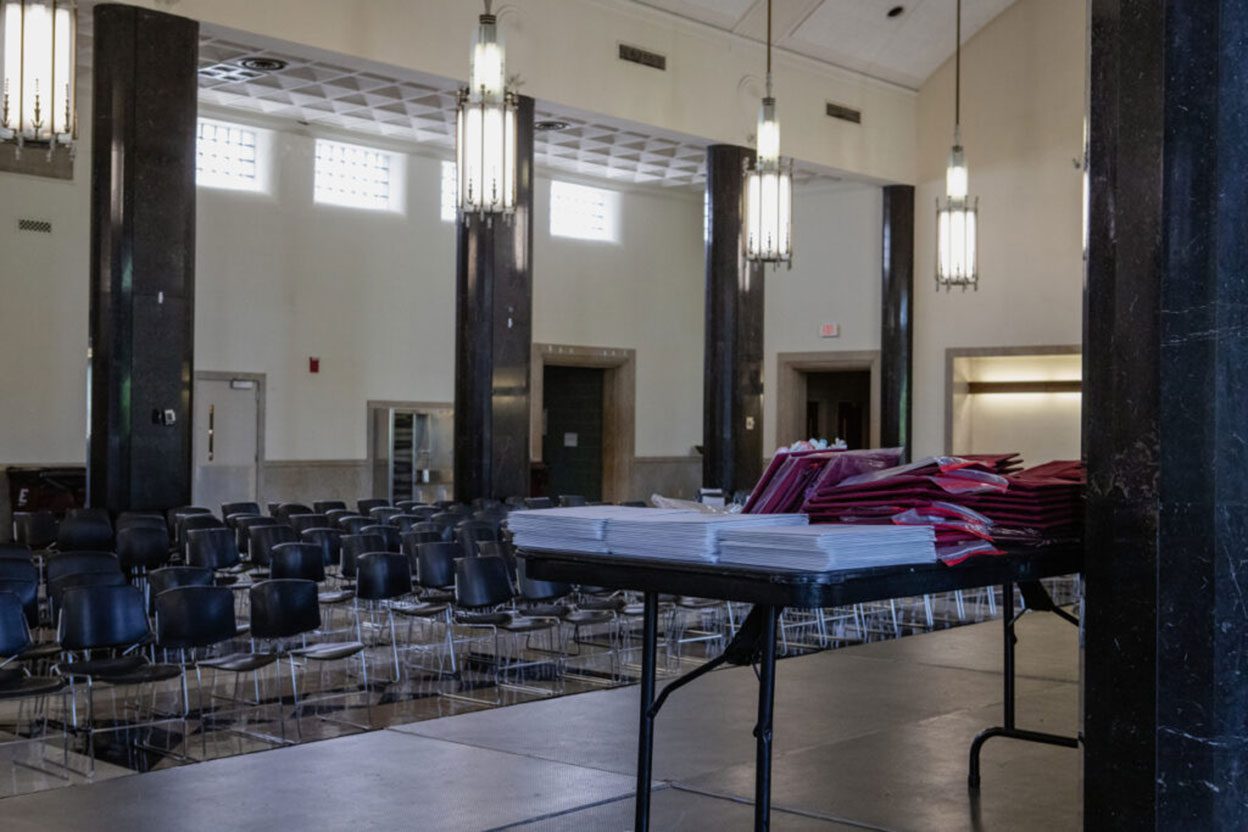 EKU 2022 Spring Honors Convocation empty chairs set up with awards on table