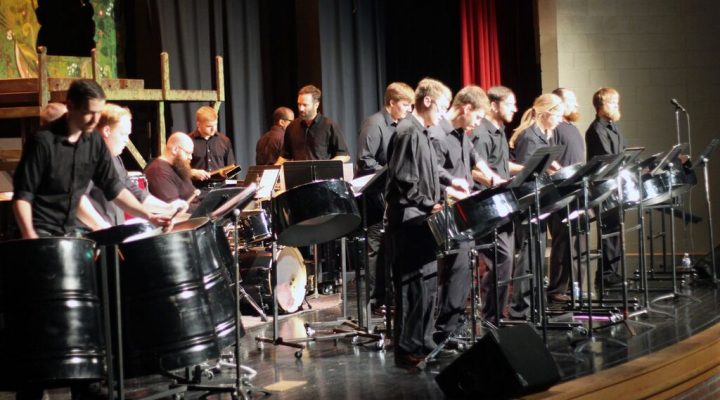 the steel band performs onstage