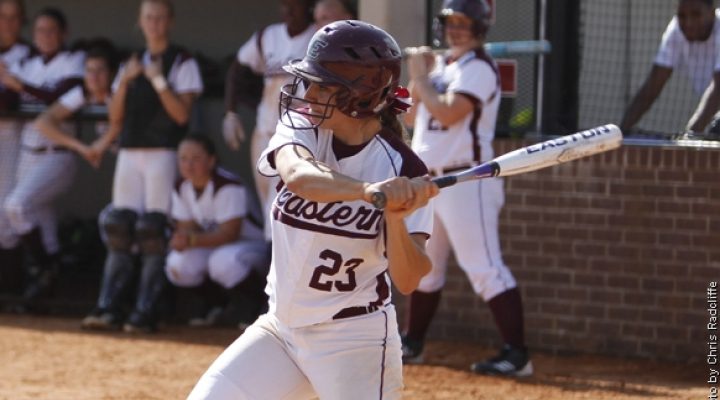 An image of a woman batting in softball at Eastern Kentucky Unviersity.