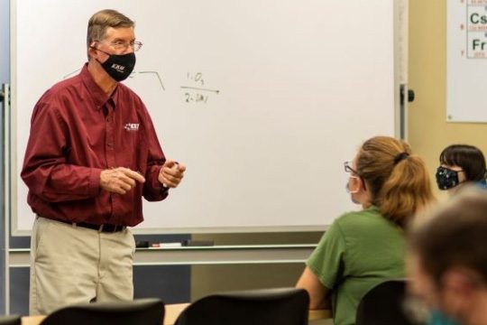 Chemistry Professor Dr. Vernon Stubblefield teaching a class