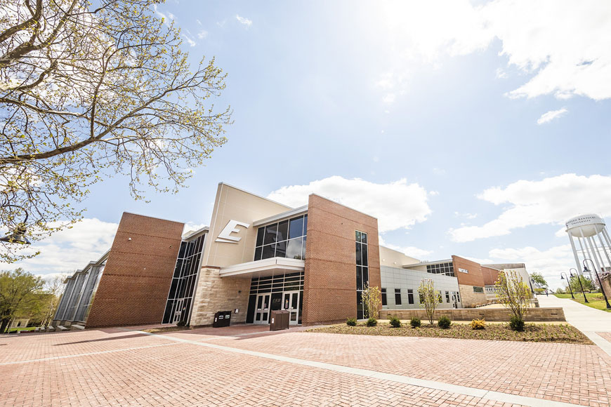 Sun shining down on the recently built Campus Recreation Center during Spring.
