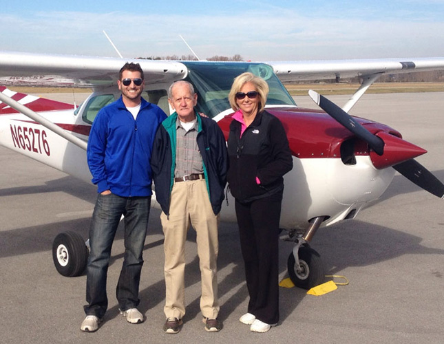  EKU Aviation Student Zach Crawford  with grandfather and mother at the airfield.