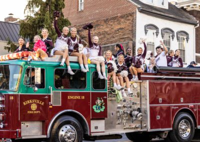 Firetruck with EKU students on it at parade