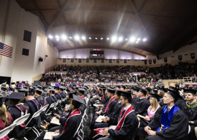 Rows of graduates at commencement ceremony