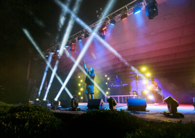View of brightly lit stage with multicolored lights