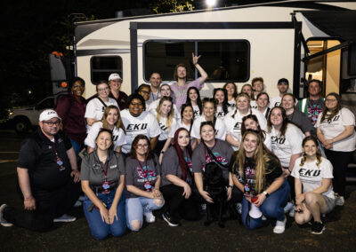 Yung Gravy poses with EKU Student Government Association students in front of RV