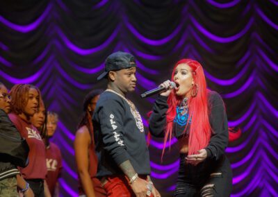 Justina Valentine and Conceited from Wild N Out with students on stage at Eastern Kentucky University.