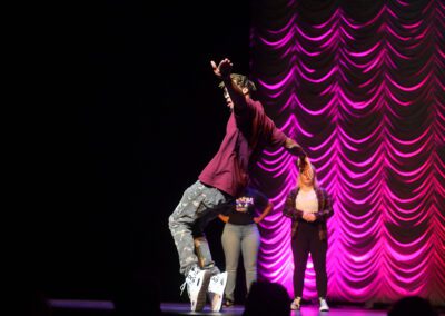 A student on stage at Wild N Out at Eastern Kentucky University.