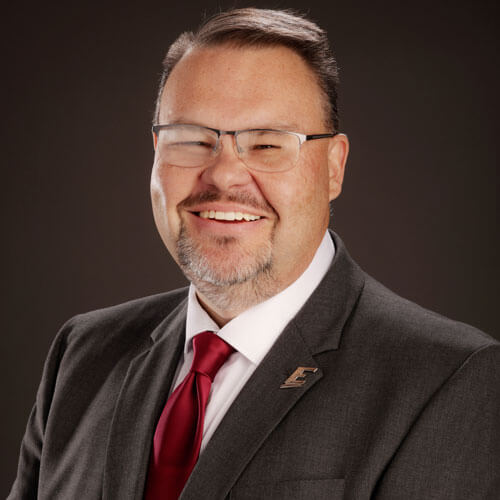 Professional headshot of Dr. Ryan Baggett