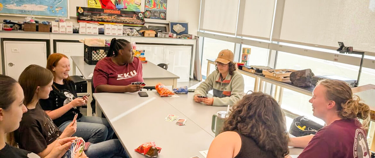 EKU STEM Club relaxes with a game of cards.