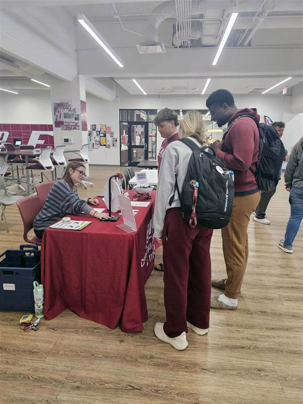 Table display for the Office of Equal Opportunity & Title IX speaking with students