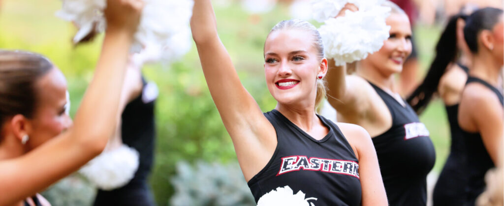 Header image of smiling EKU cheerleaders