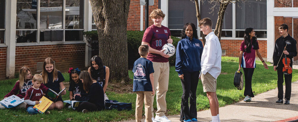 Banner image of Model Laboratory School students outside