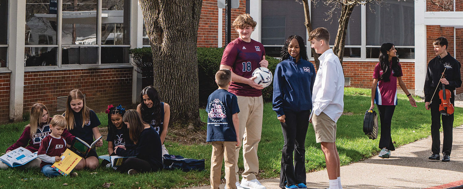 Banner image of Model Laboratory School students outside