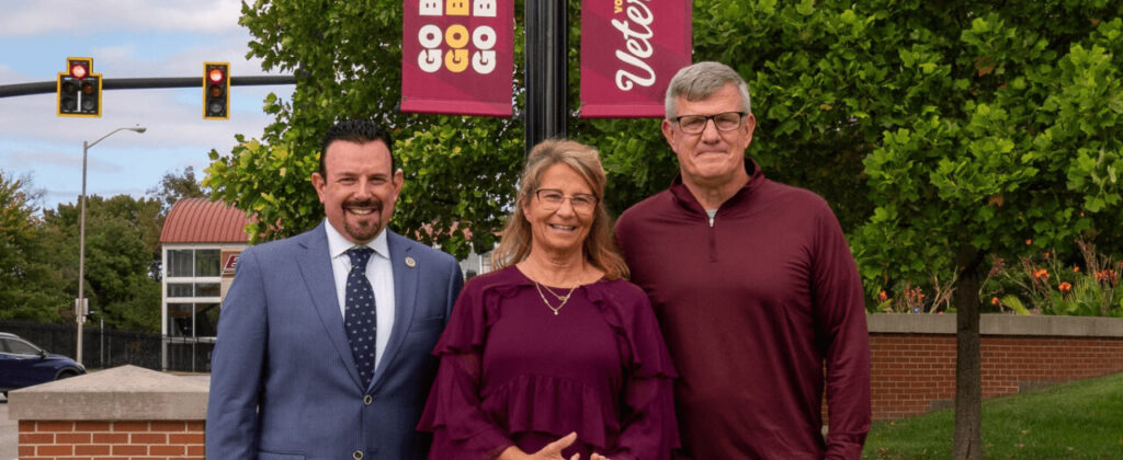 Banner image of EKU President David T. McFaddin, General James Rainey and his wife Tracy.